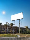 Blank billboard at roadside good viewership against clear sky