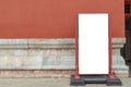 Blank billboard standing in front of red painted brick wall Royalty Free Stock Photo