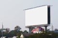 blank billboards in city with blue sky