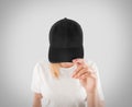 Blank black baseball cap mockup template, wear on women head Royalty Free Stock Photo