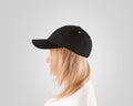 Blank black baseball cap mockup template, women head, profile, isolated Royalty Free Stock Photo