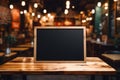 Blank Black Board on Wooden Table with Blurred Coffee Shop Background. AI Royalty Free Stock Photo