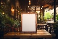 Blank Black Board on Wooden Table with Blurred Coffee Shop Background. AI Royalty Free Stock Photo