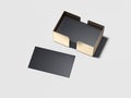 Blank black business cards with golden holder. 3d rendering