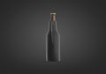 Blank black collapsible beer bottle koozie mockup, dark background