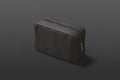 Blank black cosmetic bag mock up, dark background Royalty Free Stock Photo