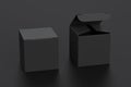 Blank black cube gift box with open and closed hinged flap lid on black background. Royalty Free Stock Photo