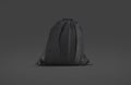 Blank black drawstring backpack mockup, dark background