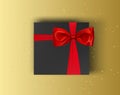 Blank, black gift box with red ribbon and bow on gold background. Vector mock up box Royalty Free Stock Photo