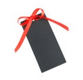 Blank black gift tag with red satin ribbon on white background, top view. Space for design Royalty Free Stock Photo