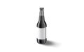 Blank black glass beer bottle with white label mockup, isolated Royalty Free Stock Photo