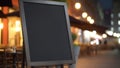 Blank black restaurant shop sign or menu board near the entrance of street cafe at night, neural network generated image Royalty Free Stock Photo