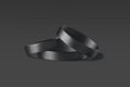 Blank black silicone wristband stack mockup, dark background Royalty Free Stock Photo