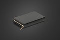 Blank black small money wallet mockup lying, dark background