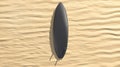 Blank black surfboard with fins lying on sand mock up