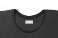 Blank black t-shirt collar with white rectangular label mock up