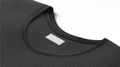 Blank black t-shirt collar with white rectangular label mockup