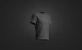 Blank black t-shirt mock up, isolated on dark background