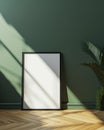 Blank black thin poster frame mock up template, room interior in scandinavian style, dark green walls, wooden floor and Royalty Free Stock Photo