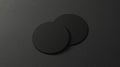 Blank black two beer coasters mockup set on dark surface