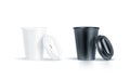 Blank black and white disposable paper cup opened plastic lid