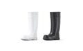 Blank black and white rubber wellington boots mockup, half-turned view Royalty Free Stock Photo