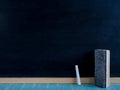 Blank blackboard chalks and eraser. Royalty Free Stock Photo