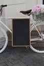 Blank blackboard label and bicycle Royalty Free Stock Photo