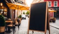 Blank blackboard restaurant shop sign or menu boards near the entrance to restaurant. Cafe menu on the street Royalty Free Stock Photo