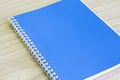 Blank blue book empty cover book spiral stationery school supplies for education business idea book cover design note pad memo on Royalty Free Stock Photo