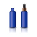 Blank blue clear cosmetic round bottle with dropper lid for beauty product packaging. Royalty Free Stock Photo