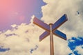 Blank blue traffic road signs in bright sky with clouds. Royalty Free Stock Photo