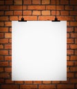 Blank board hanging on brick wall Royalty Free Stock Photo