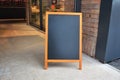 Blank board menu mock-up, stand at the entrance of the restaurant Royalty Free Stock Photo