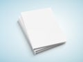 Blank A4 book hardcover pile mockup isolated on blue 3D rendering Royalty Free Stock Photo