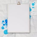 Blank book and splash colors choice Royalty Free Stock Photo
