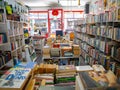 Blank Books on a quiet afternoon. Colorful assortment of books stacked on shelves.