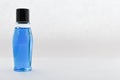 Blank  bottle, blue liquid Royalty Free Stock Photo