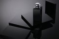 Blank Bottle Cosmetics on crystal black square podium background