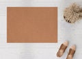 Blank brown door mat on the floor at home. Welcome mat with copy space for your text. Doormat mock up. Carpet at Royalty Free Stock Photo