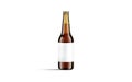 Blank brown glass beer bottle with white label mock up