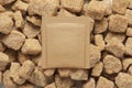 Blank brown paper sachet pack on sugar cubes. 3D rendering and photo Royalty Free Stock Photo