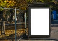 Blank bus stop advertisement billboard in urban city environment