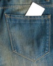 Blank business card in a pocket of blue worn out jeans. Royalty Free Stock Photo