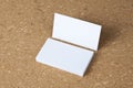 Blank business cards on corkboard background Royalty Free Stock Photo