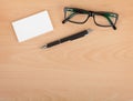 Blank business cards with pen and glasses Royalty Free Stock Photo