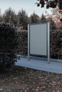 Blank canvas banner stand at park. Empty billboard advertising. 3d rendering.
