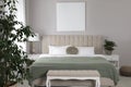 Blank canvas on wall in stylish bedroom interior. Space for design Royalty Free Stock Photo