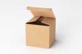 Blank cardboard cube gift box with opened hinged flap lid on white background.