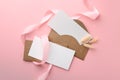 Blank cards, envelopes, ribbon and spikelets on pink background, flat lay Royalty Free Stock Photo